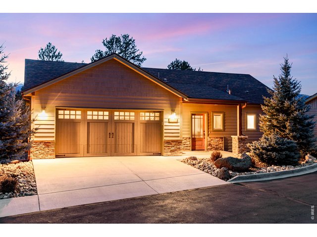 Property Photo 1 Concrete driveway and beautiful low maintenance landscaping.