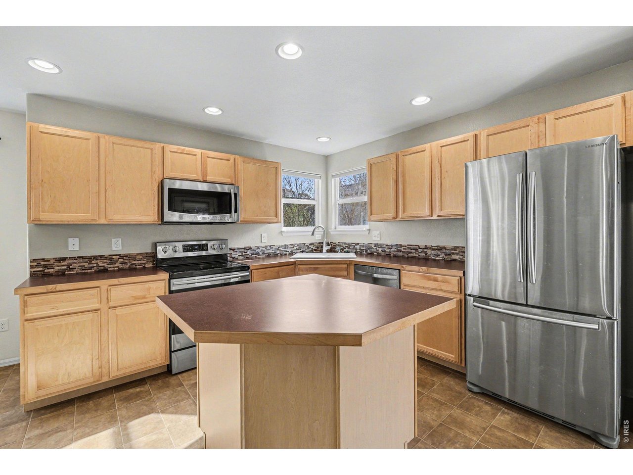 Property Photo 6 Kitchen with stainless steel appliances all included