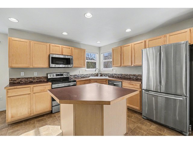 Property Photo 6 Kitchen with stainless steel appliances all included