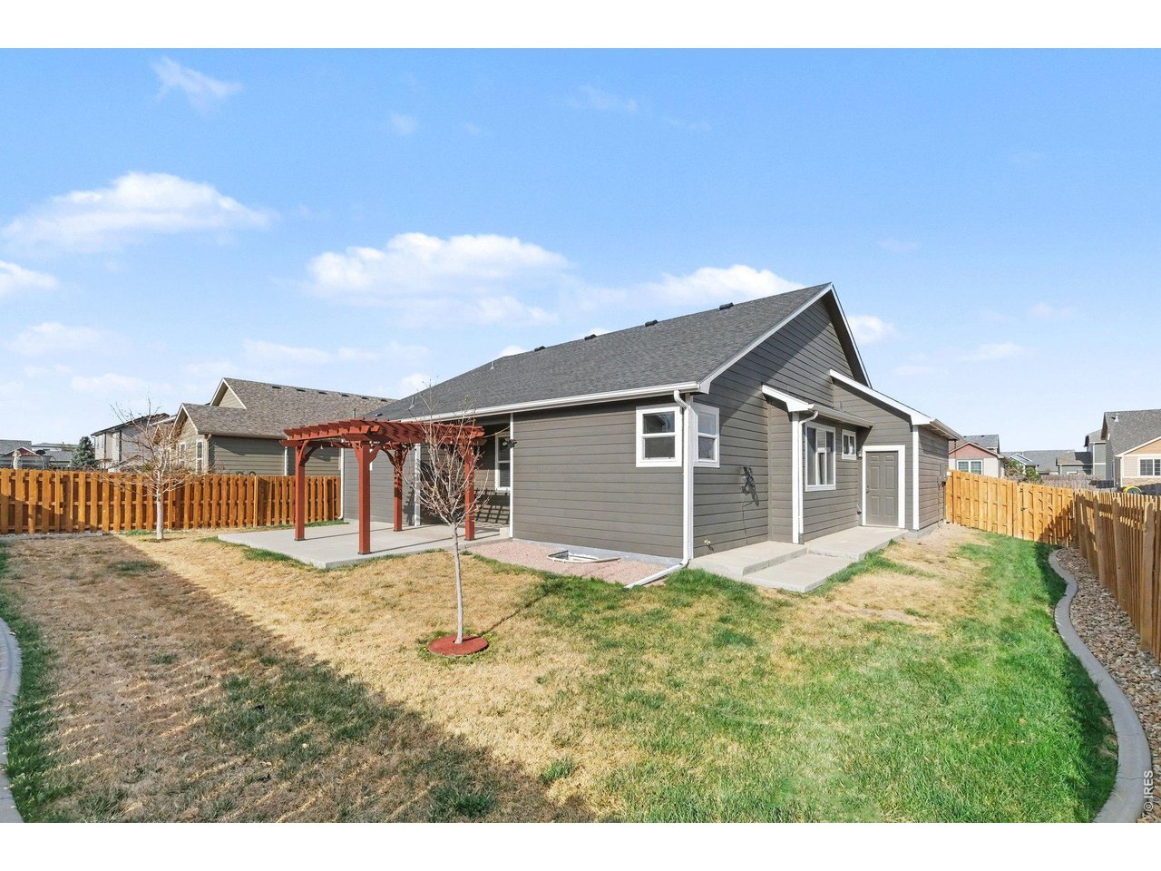 Property Photo 14 Large backyard with sprinkler system