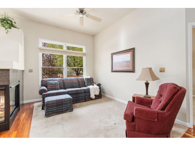Property Photo 9 Cozy living room with a 3 sided fireplace