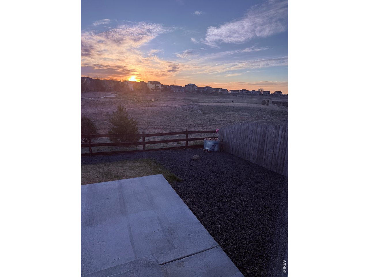 Walking paths are on the far side of open space