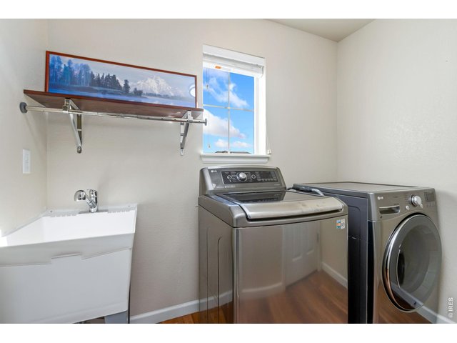 Property Photo 25 Upper floor laundry w/sink