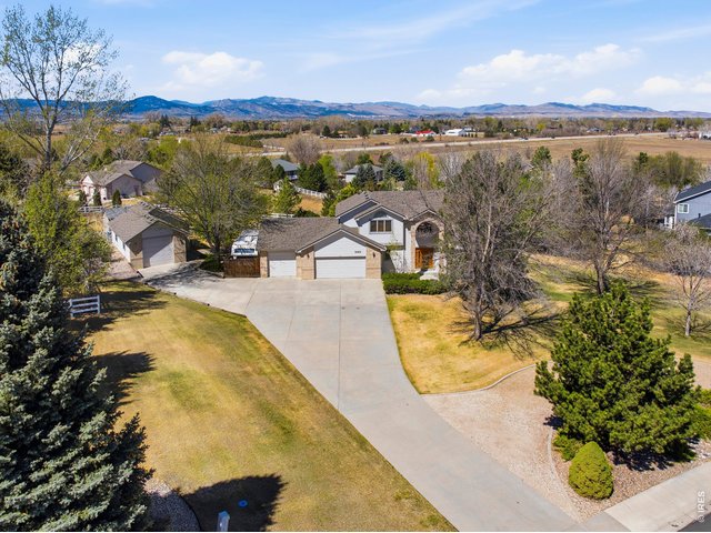 Property Photo 1 Fabulous Setting in SE Loveland-Beautiful Mountain Views One Owner Home on .82 Acre Lot Long Paved Driveway Circle Drive with Electrical Hook ups
