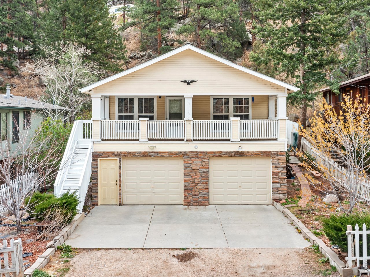 Oversized two-car garage, complete with 13x12 storage room and 13x13 workshop area