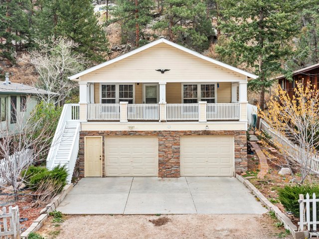 Property Photo 30 Oversized two-car garage, complete with 13x12 storage room and 13x13 workshop area