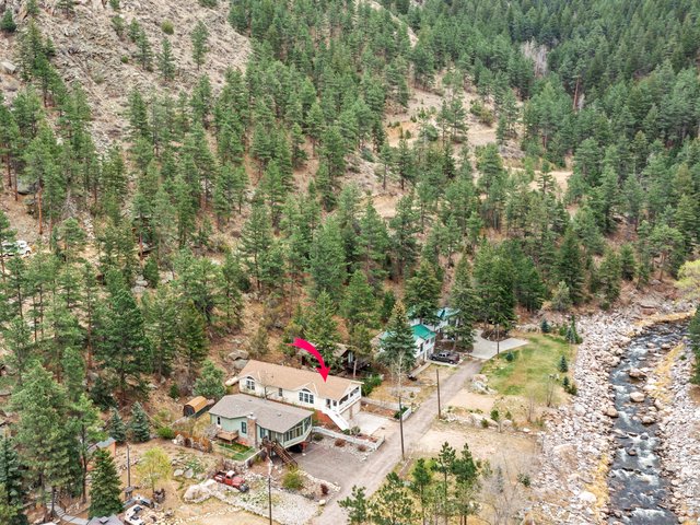 Property Photo 3 Lots 6 & 7 include the lot across the street fronting the river 