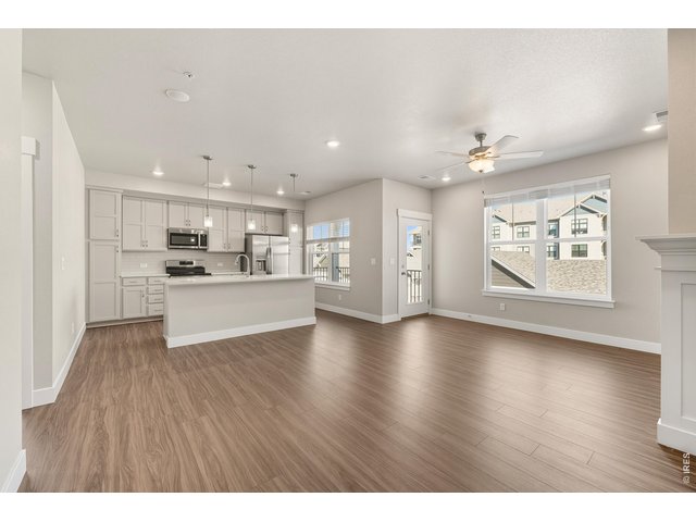 Property Photo 4 Enjoy extended luxury vinyl into the living room