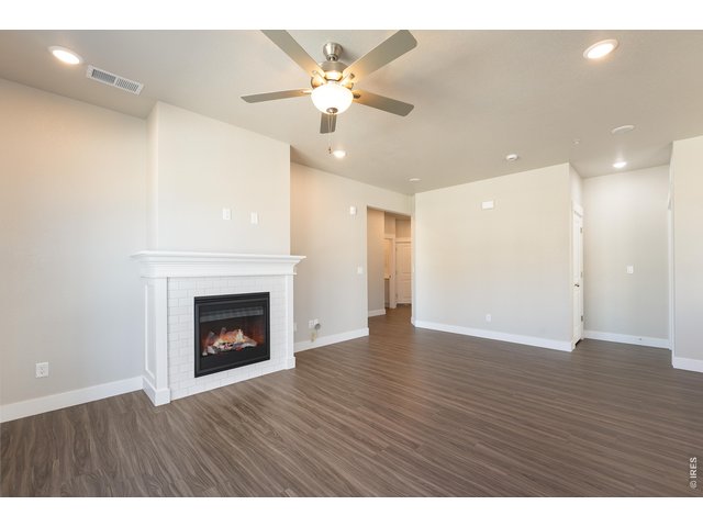 Property Photo 7 Control comfort with your included ceiling fan and gas fireplace. 