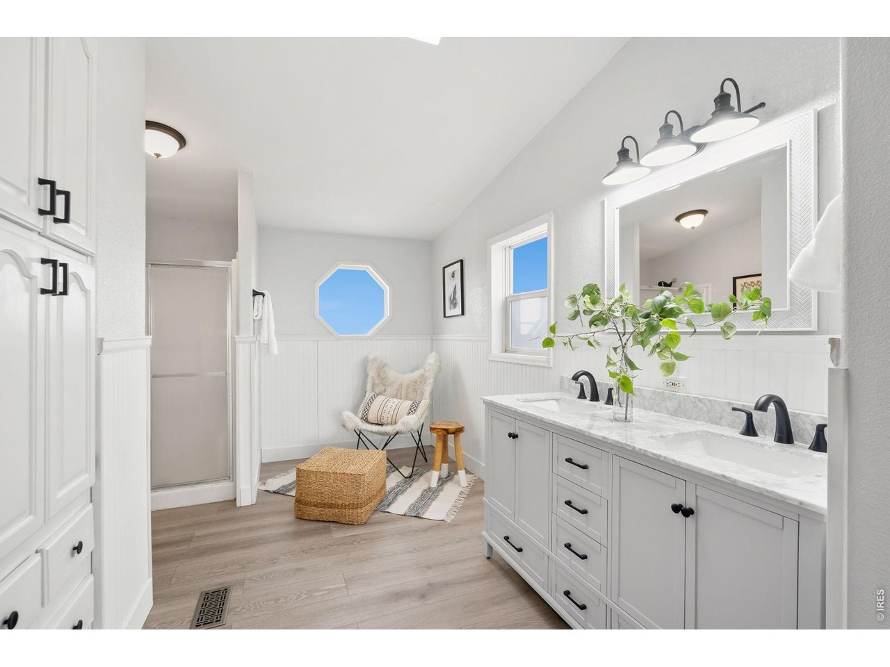 Updated Master bathroom: New floors, new vanity, and new lighting