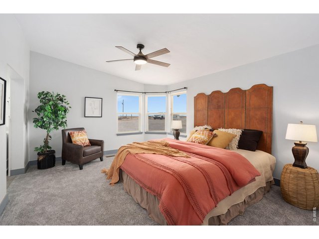 Property Photo 19 Master bedroom with new carpet and fresh paint