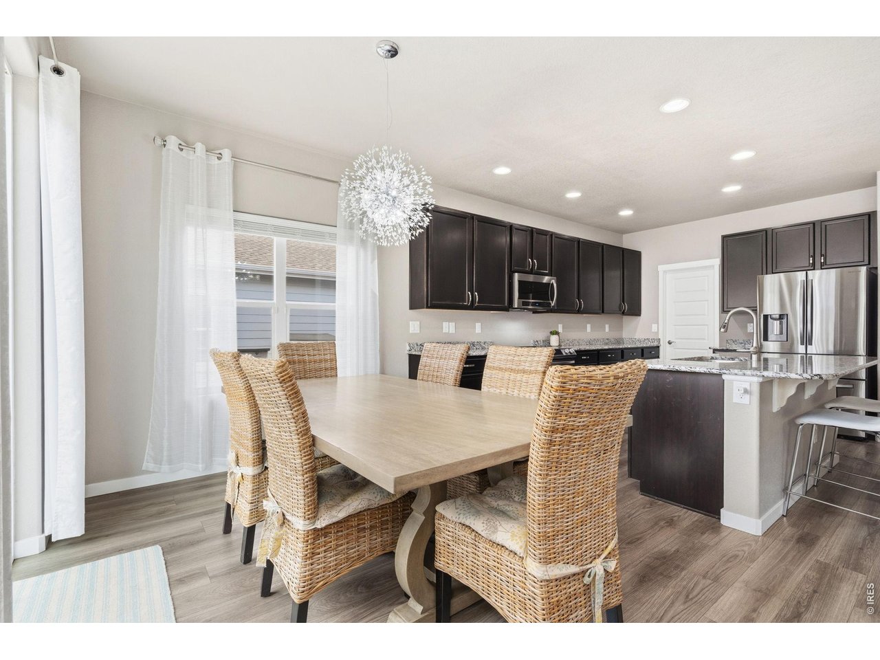 Open dining area connected to kitchen and living room