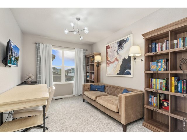 Property Photo 26 Upstairs, additional upstairs flex room with French doors, perfect second office, playroom, or media space