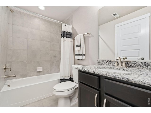 Property Photo 36 Full basement bathroom with granite countertops