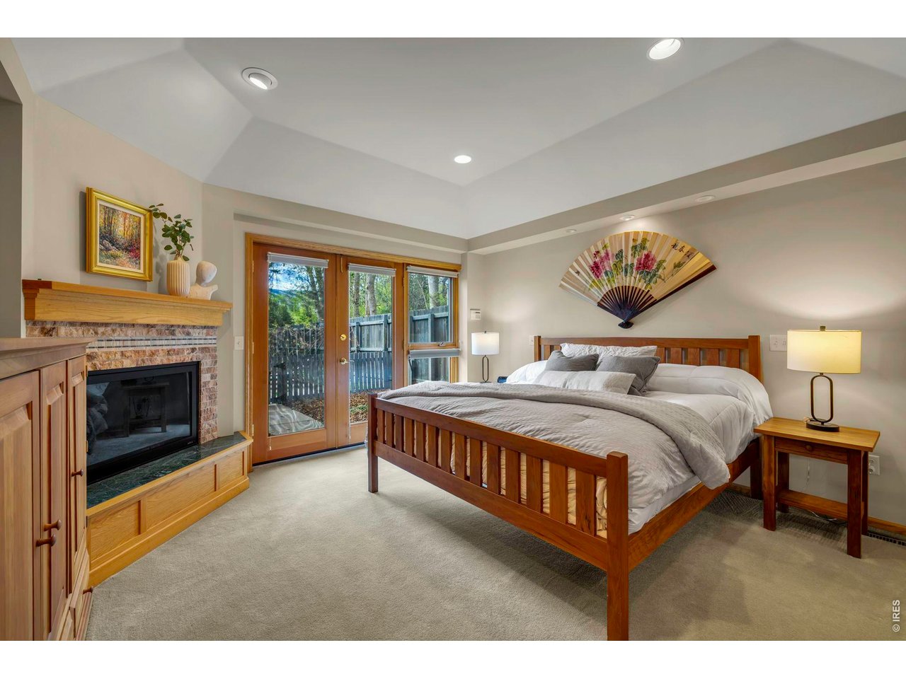 Main level primary with yard and pool access