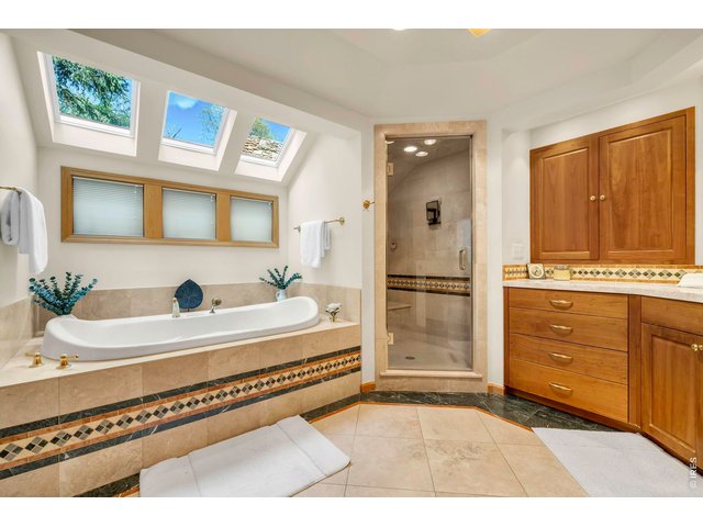 Property Photo 28 Primary bath with jetted tub and steam shower