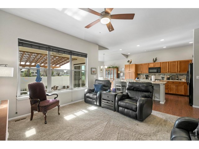 Property Photo 25 Nice Carpet and Ceiling Fan, Tall Ceilings