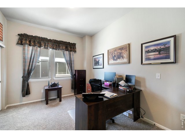 Property Photo 15 Main Floor Office with French Doors. Could easily be a 3rd Bedroom