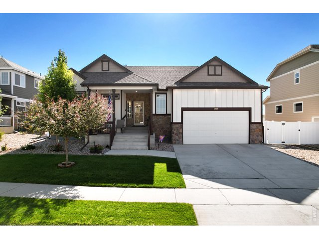 Property Photo 4 Stunning Curb Appeal with Beautiful Flowering Trees!