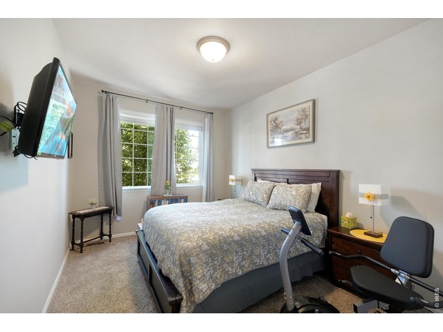 Property Photo 13 Up Front Main Floor Guest Bedroom with own Full Bathroom