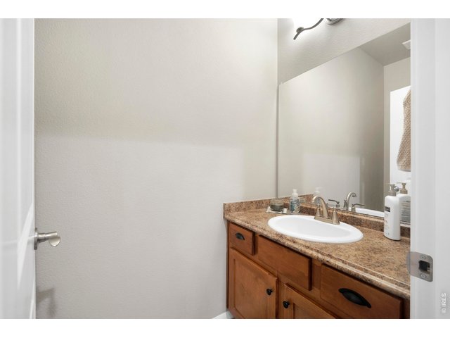 Property Photo 35 Nice Half Bathroom off the Garage Entry
