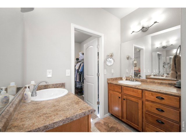 Property Photo 31 Separate His and Her Sinks with tall Vanities and large Walk-In Closet