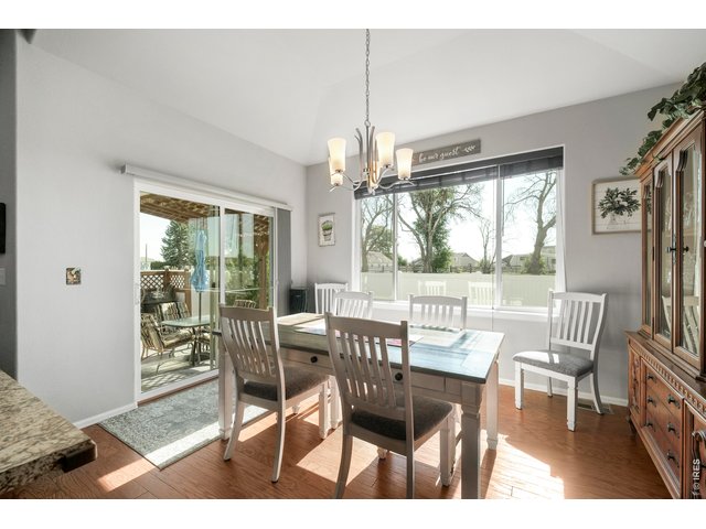 Property Photo 21 Oversized Glass Sliding Back Door to Pergola Covered Patio-with Outdoor Fan