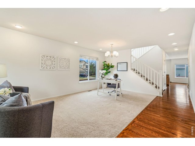 Property Photo 5 Large open entryway would be perfect for an in home office and formal dining area