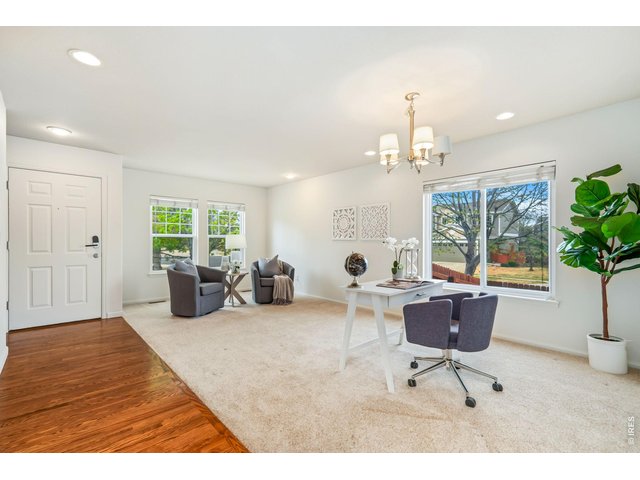 Property Photo 4 Front office area and formal dining space