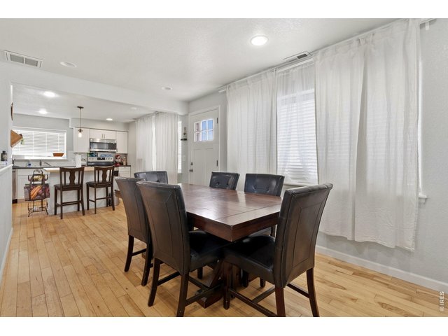 Property Photo 10 Dining area, perfect for entertaining. Flows seamlessly into the kitchen. 