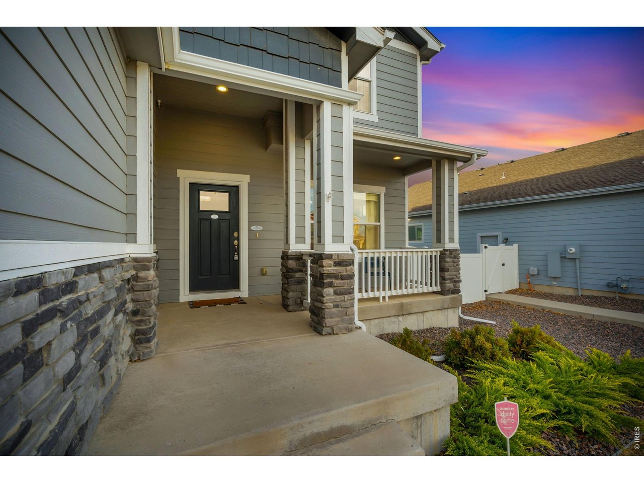 Welcoming covered front porch with great curb appeal