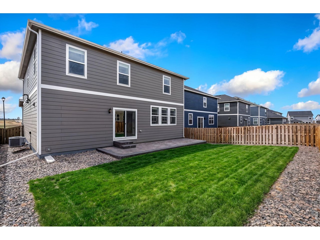 Lawn photos have been enhanced to showcase spring/summer potential. 
