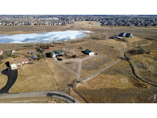 Property Photo 1 Surrounded by nature, this lovely acreage is your getaway without the rural drive time!
