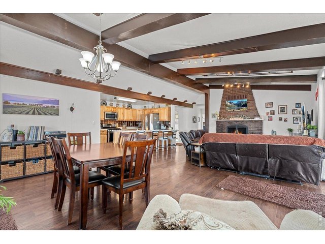 Property Photo 11 Open Concept dining room, living room and kitchen.