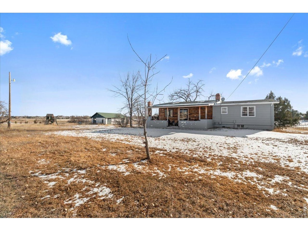 Backyard looking out onto the pasture and remaining portion of the property.
