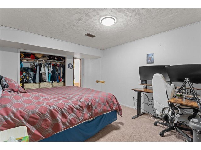 Property Photo 27 Basement bedroom with closet and fresh paint (nonconforming due to no egress)