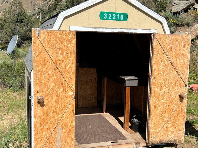Property Photo 25 Workbench inside storage shed.
