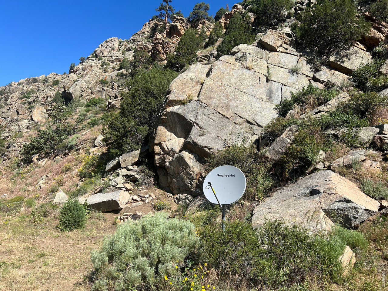 Satellite dish compatible with HughesNet internet.