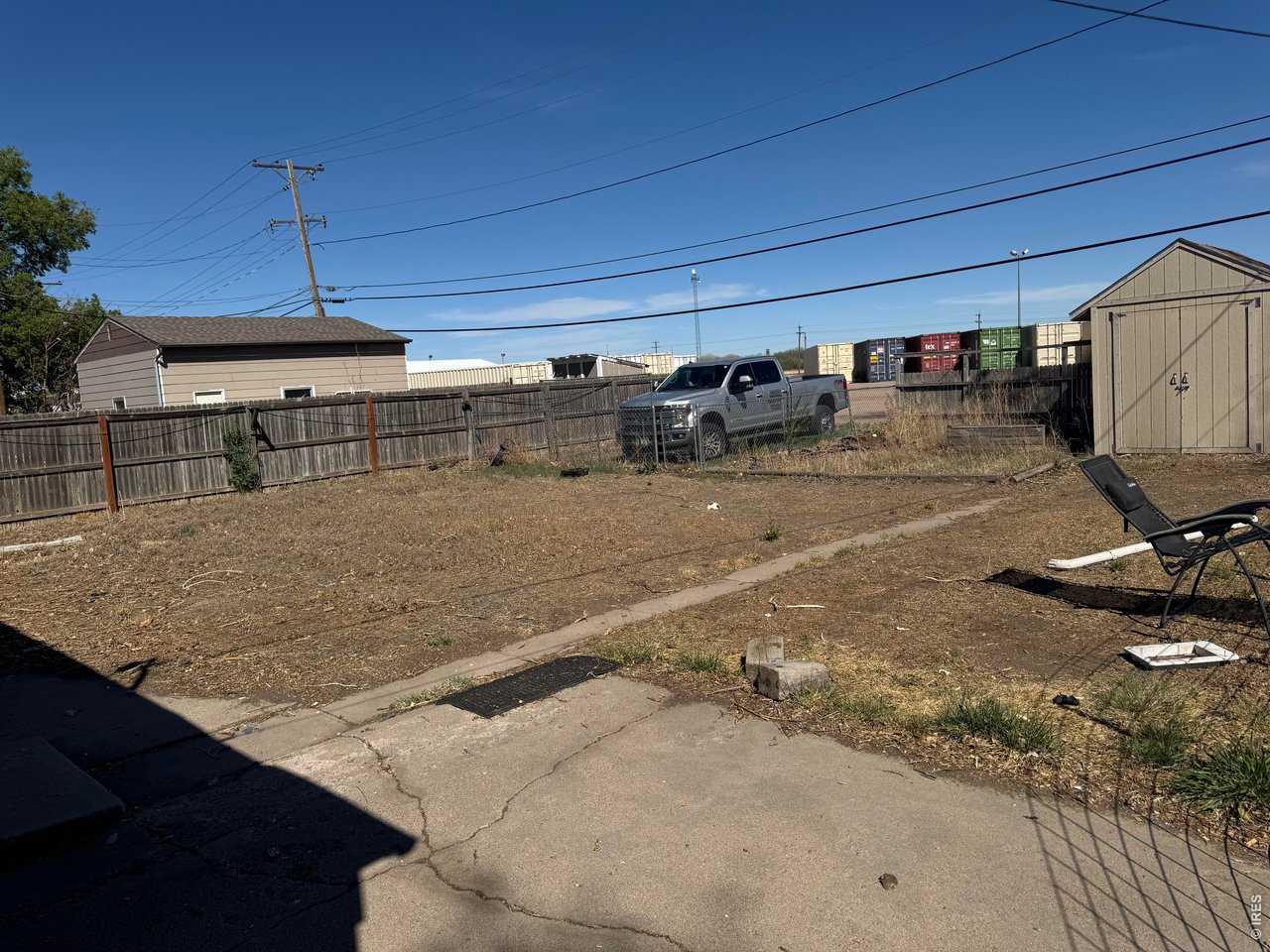 Large Fenced in Back yard City is in the process of putting the backyard fence back up after replacing water line