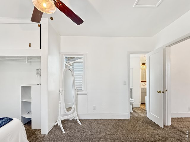 Property Photo 18 Primary Bedroom has door to bathroom