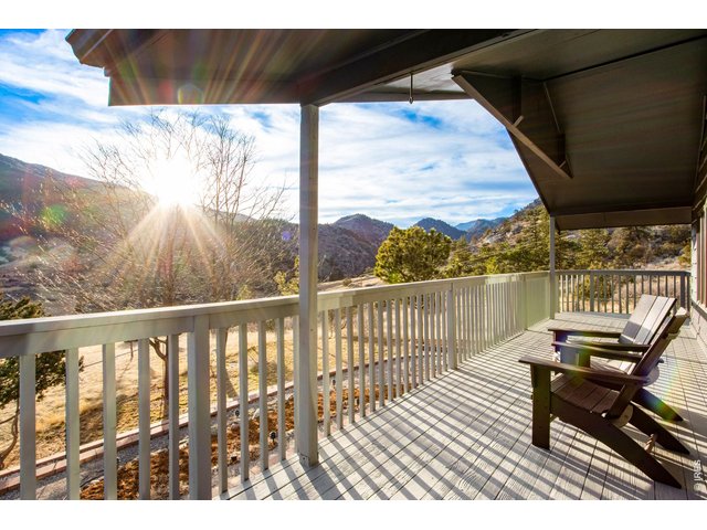 Property Photo 9 Expansive views from the wrap around deck!