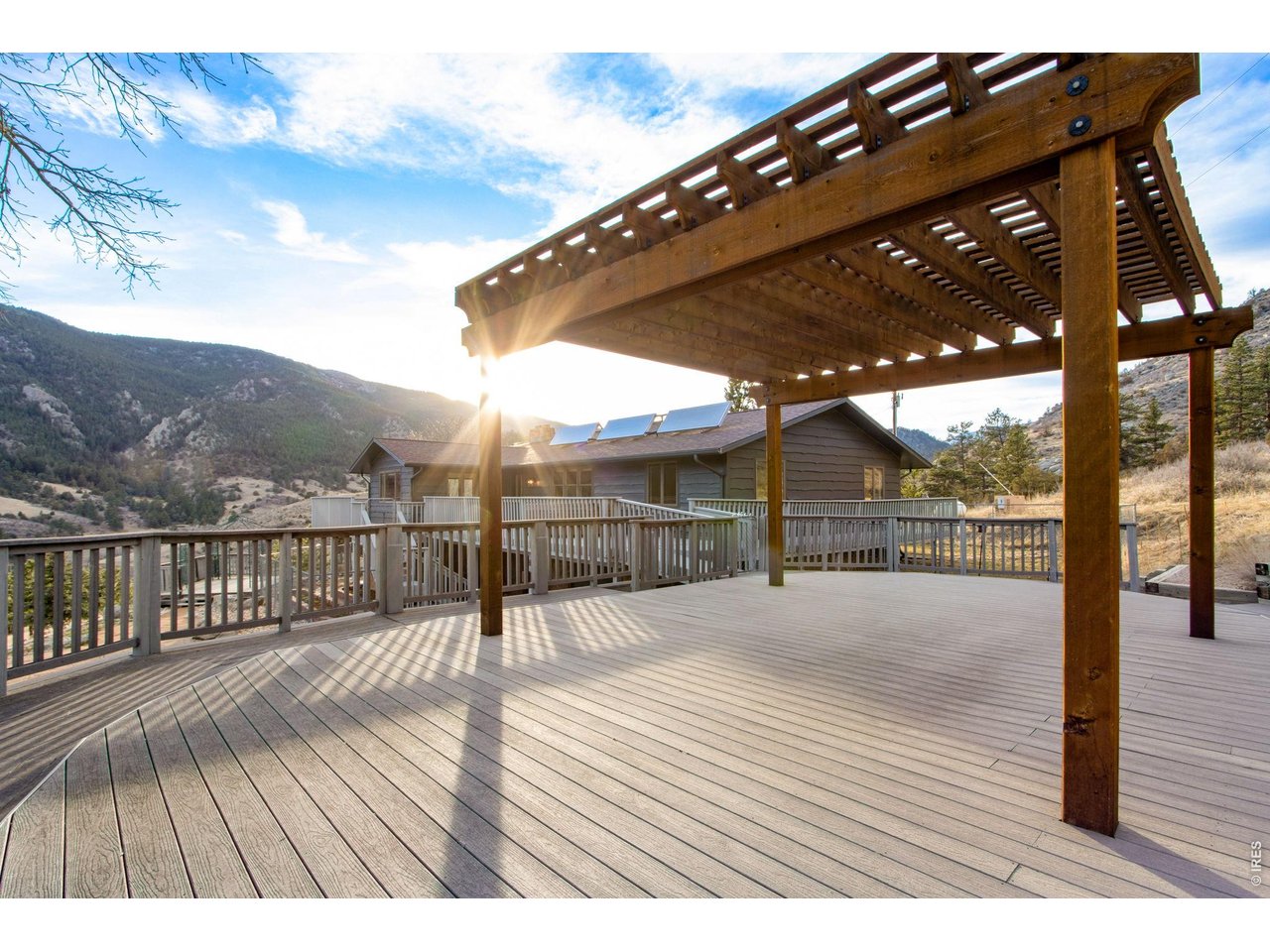 Pergola sitting on the expansive deck system, an ideal setting for gatherings with friends and family! The perfect place to host! This spot was previously a swimming pool.