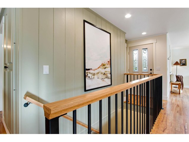 Property Photo 13 Enter a spacious foyer w/ hardwood floors, colonial doors, new trim, double pane windows, fresh paint, updated electric & plumbing, & new light fixtures.