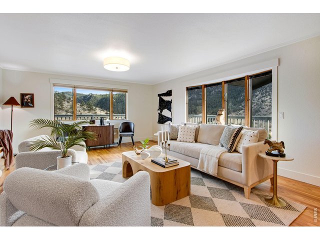 Property Photo 17 Incredible views from the main living area! Abundant natural light throughout the main level.