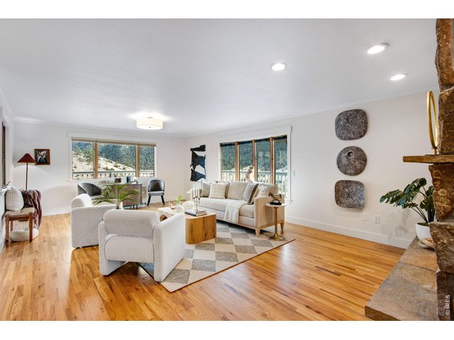 Property Photo 18 Incredible views from the main living area! Abundant natural light throughout the main level.
