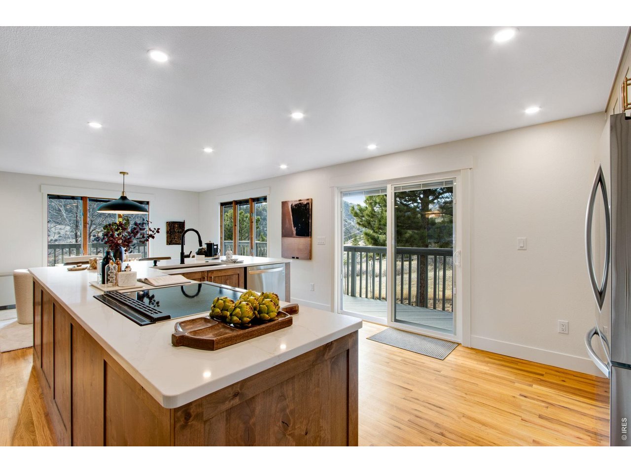 Kitchen has direct access to the wrap around deck perfect for entertaining inside or out.