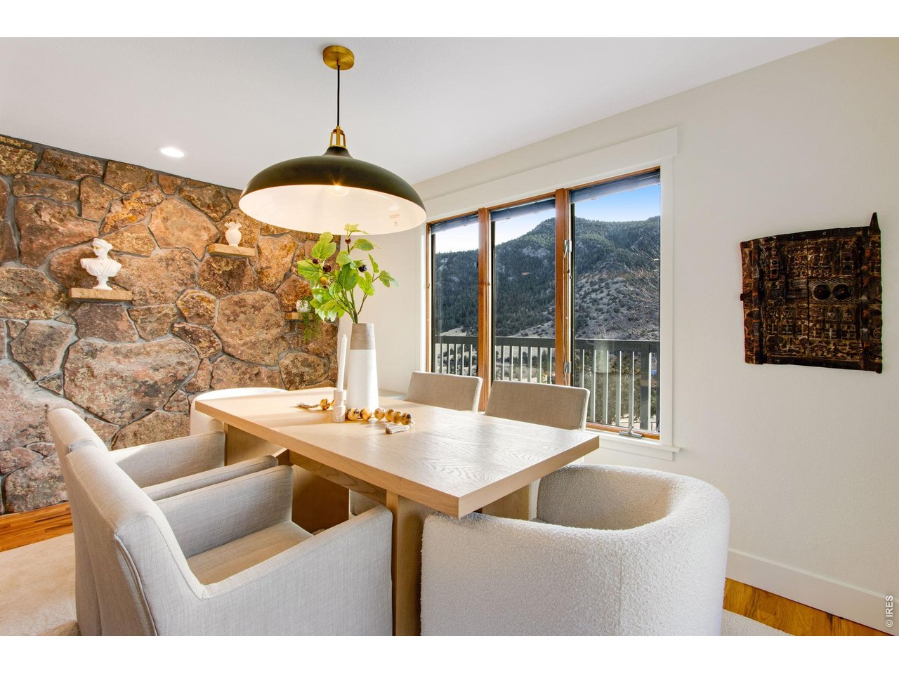 Large dining area with panoramic views and updated lighting features.