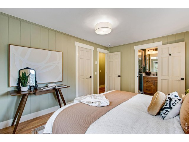 Property Photo 31 Primary suite w/ private bath, quartz countertops, floor-to-ceiling tile shower, & full-length walk-in closet.