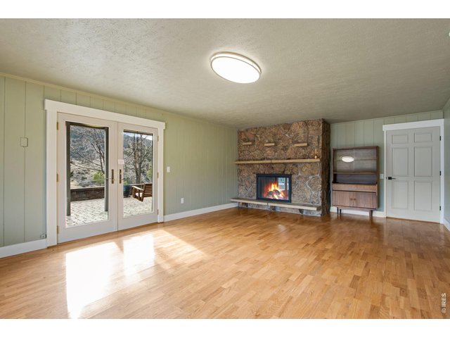 Property Photo 36 The lower level wood-burning fireplace