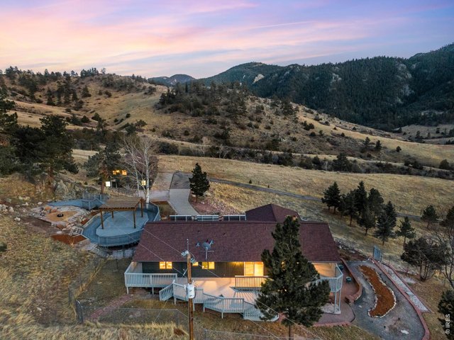 Property Photo 46 Mechanical highlights include Starlink internet, owned solar, backup generator w/ propane tank, well & reserve tank, 500-gallon cistern, Steffes energy efficient heat, water softener & filtration, 50-gallon water heater.
